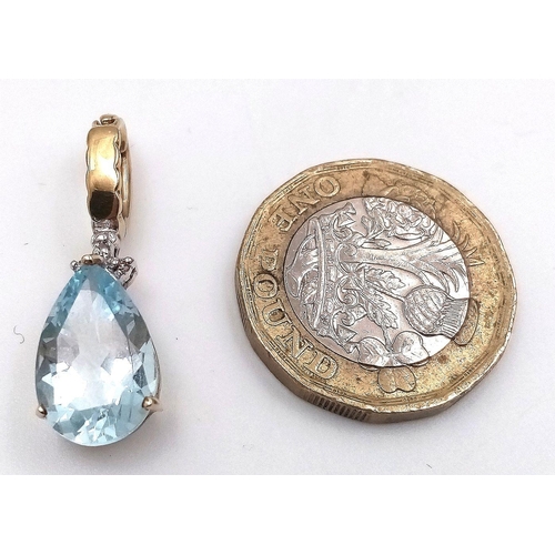 167 - Impressive  9 carat GOLD,  PEAR CUT BLUE TOPAZ PENDANT. DIAMOND DETAIL set to top. Beautifully facet... 