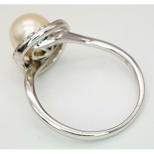 177 - A 14K WHITE GOLD DIAMOND & PEARL SWIRL RING 3.2G SIZE O. Ref: CHIN 5001