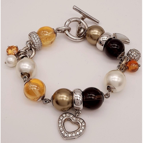 223 - Beautiful SILVER ‘TI SENTO’ of  MILAN CHARM BRACELET. Complete with original satin pouch. Condition ... 