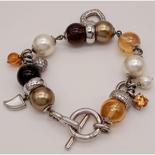 223 - Beautiful SILVER ‘TI SENTO’ of  MILAN CHARM BRACELET. Complete with original satin pouch. Condition ... 