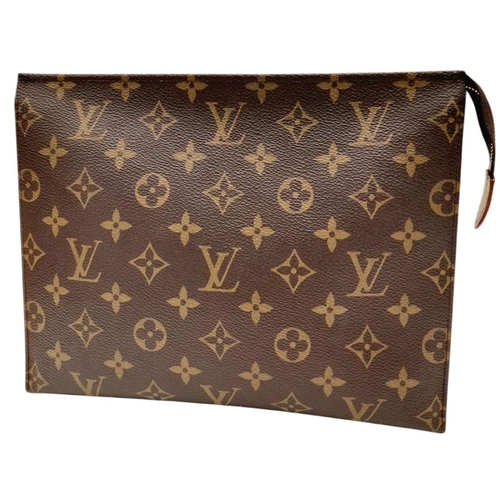 283 - A Louis Vuitton Monogram Toiletry Pouch. Brown LV monogram on toile coated canvas exterior, gold-ton... 