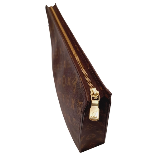 283 - A Louis Vuitton Monogram Toiletry Pouch. Brown LV monogram on toile coated canvas exterior, gold-ton... 