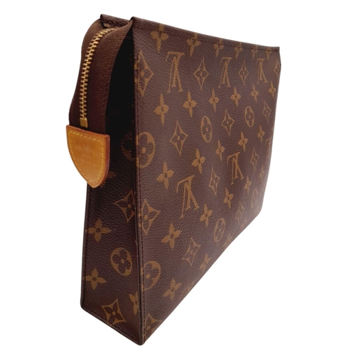 283 - A Louis Vuitton Monogram Toiletry Pouch. Brown LV monogram on toile coated canvas exterior, gold-ton... 