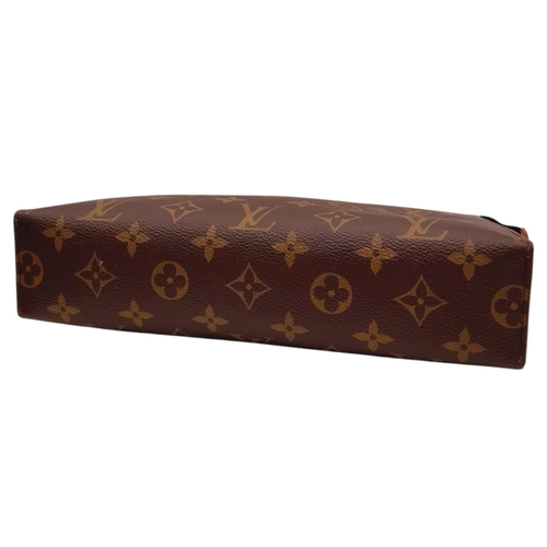 283 - A Louis Vuitton Monogram Toiletry Pouch. Brown LV monogram on toile coated canvas exterior, gold-ton... 