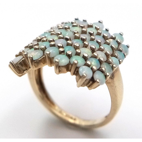 35 - Impressive 9 carat GOLD and OPAL CLUSTER RING. Having 49 x FIRE OPALS Mounted to top. Full UK hallma... 