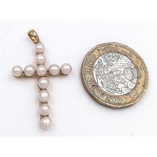 407 - Beautiful  9 carat GOLD CROSS covered in PEARLS. Full UK Hallmark. 1.97 grams. Please see pictures.