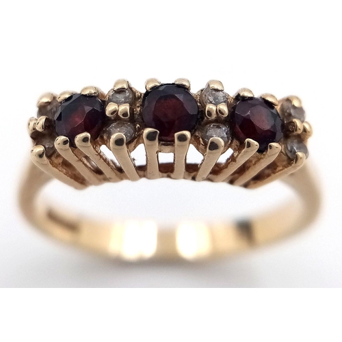 7 - Fabulous 9 carat GOLD, GARNET and DIAMOND TRILOGY RING. Fully hallmarked. Complete with ring box. 2.... 