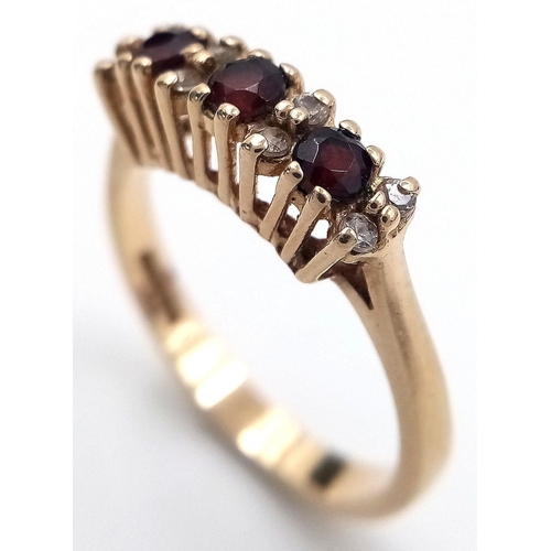 7 - Fabulous 9 carat GOLD, GARNET and DIAMOND TRILOGY RING. Fully hallmarked. Complete with ring box. 2.... 