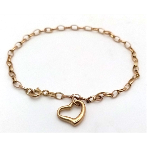 1090 - A 9K Yellow Gold Link Bracelet with Hanging Heart Decoration. 18cm. 1.1g weight.