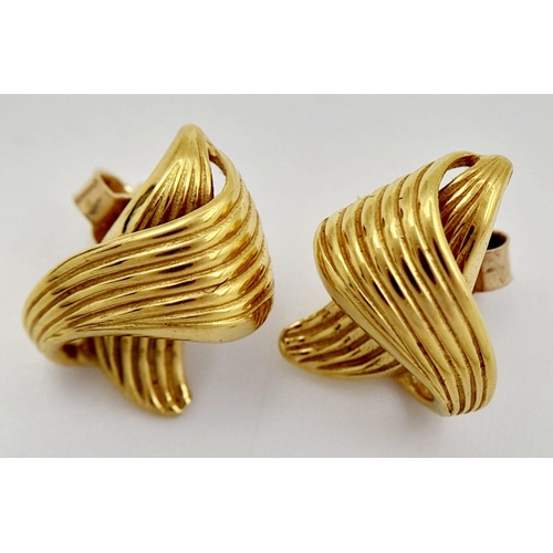 104 - Beautiful pair of 9 carat GOLD SCULPTED KNOT EARRINGS. Presented in jewellers earring box.  3.2 gram... 