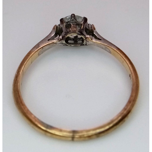 1114 - Impressive vintage 9 carat GOLD, ZIRCONIA SOLITAIRE RING. Having fancy shoulders with a sparkling 0.... 