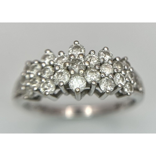 113 - A 14K White Gold Diamond Pave Ring in a Three, Two Formation. Size R. 3.8g total weight. ref: STK019... 