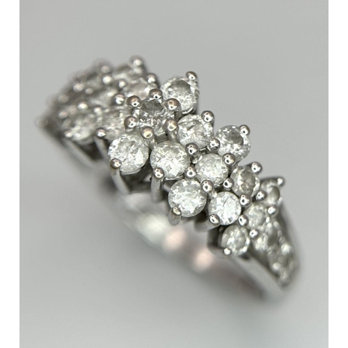 113 - A 14K White Gold Diamond Pave Ring in a Three, Two Formation. Size R. 3.8g total weight. ref: STK019... 