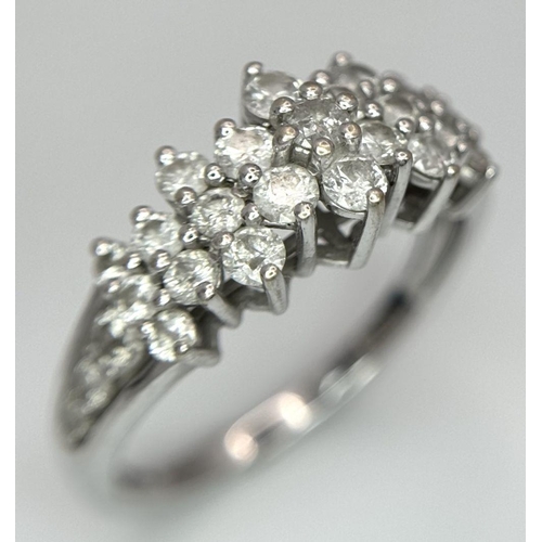 113 - A 14K White Gold Diamond Pave Ring in a Three, Two Formation. Size R. 3.8g total weight. ref: STK019... 