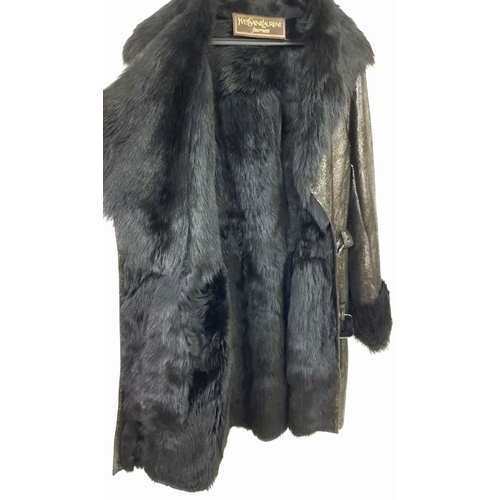 119 - A unique YVES SAINT LAURENT, fur lined, knee length, black “metallic” leather coat with fur collar a... 