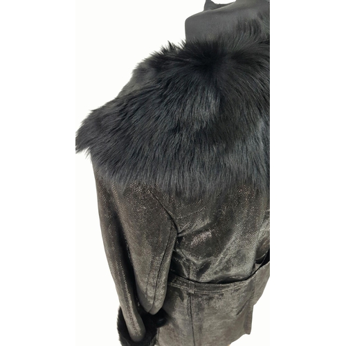 119 - A unique YVES SAINT LAURENT, fur lined, knee length, black “metallic” leather coat with fur collar a... 