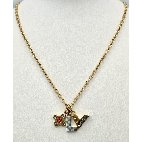 127 - A Louis Vuitton Gold Plated Necklace with Hanging LV Charms/Pendants. 52cm necklace length. ref: STK... 