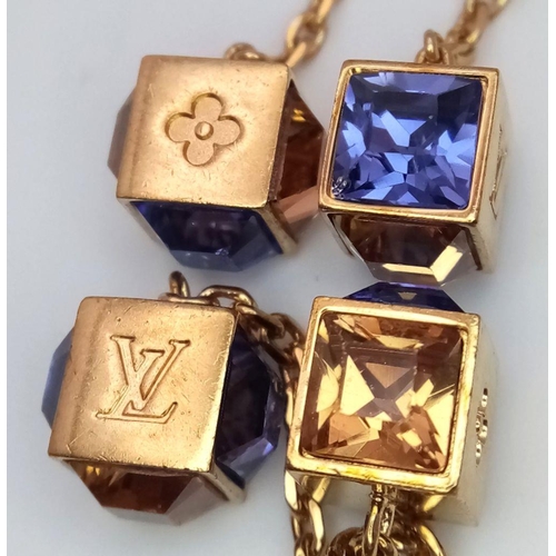 134 - A Pair of Louis Vuitton Stone Set Drop Earrings. Two purple stone cubes in a 6 and 4cm drop. ref: ST... 