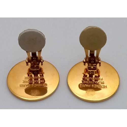 141 - A Pair of Hermes Gold Plated Earrings. 2cm diameter. ref: STK019609