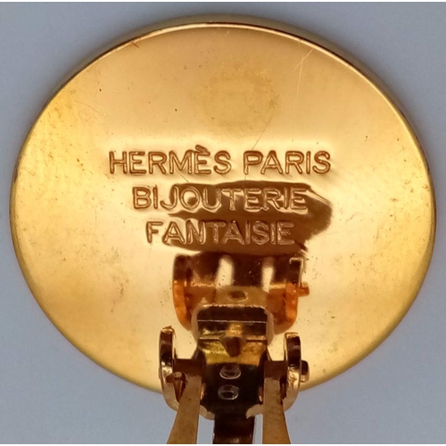 141 - A Pair of Hermes Gold Plated Earrings. 2cm diameter. ref: STK019609