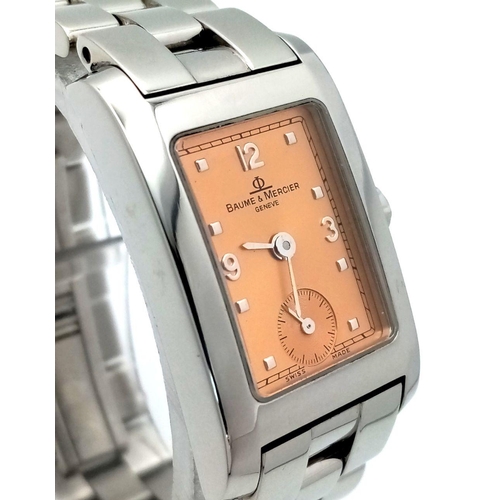 190 - A Baume and Mercier Quartz Movement Ladies Watch. Stainless steel bracelet and case - 20mm. Champagn... 