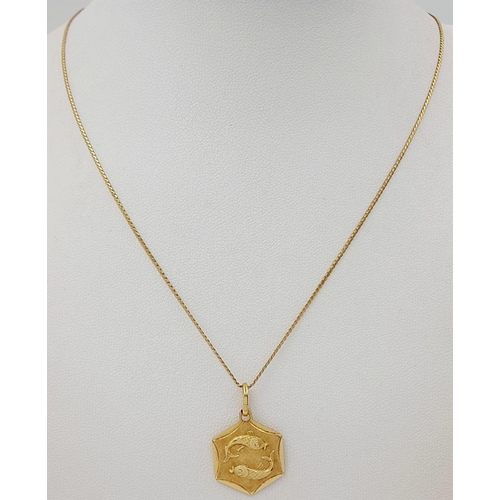 198 - AN 18K GOLD PISCES PENDANT ON A 52cms 18K GOLD FINE CHAIN .    6.6gms