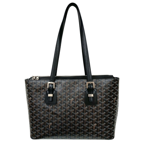 211 - A Goyard Monogrammed Tote Bag. Coated canvas exterior with black leather trim, silver-tone hardware,... 