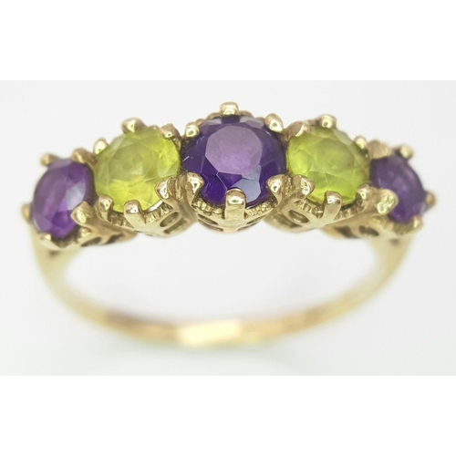 219 - A 9K GOLD RING WITH AMETHYST AND CITRINE STONES .   2.3gms    size N