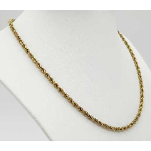 256 - A 9K GOLD ROPE TWIST NECK CHAIN .      3.8gms    40cms