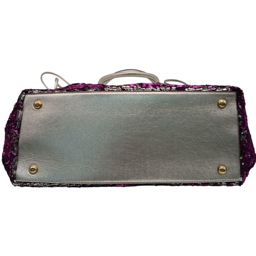 285 - A Dolce & Gabbana Sequin Tote Bag. Silver and purple sequined exterior with leather handles and gold... 