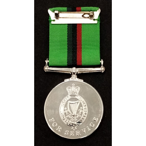 288 - A Royal Ulster Constabulary Service Medal, named to: R/Const A McClune (Reserve Constable). Mounted ... 