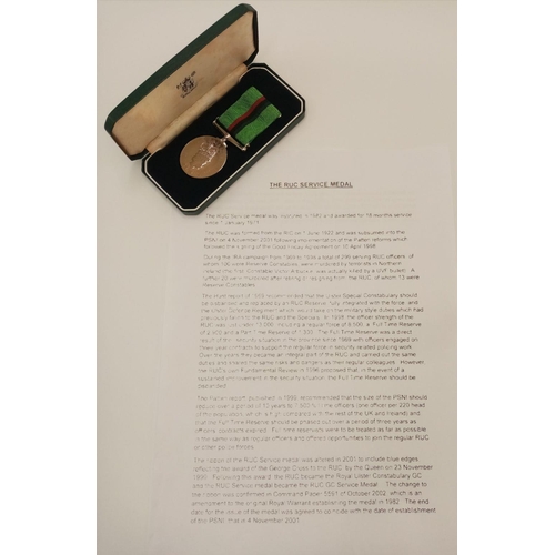 288 - A Royal Ulster Constabulary Service Medal, named to: R/Const A McClune (Reserve Constable). Mounted ... 