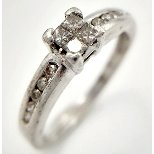 291 - A PLATINUM AND DIAMOND RING WITH DIAMOND SHOULDERS  .25ctw   4.1gms    size L