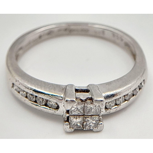 291 - A PLATINUM AND DIAMOND RING WITH DIAMOND SHOULDERS  .25ctw   4.1gms    size L