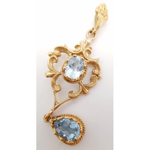 42 - A magnificent large 9 carat GOLD and BLUE TOPAZ PENDANT. Victorian style. Having an exceptional Oval... 