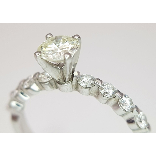 47 - A 14K WHITE GOLD DIAMOND SOLIATIRE WITH DIAMOND SET SHOULDERS RING, 0.40CT ROUND BRILLIANT CENTRE ST... 