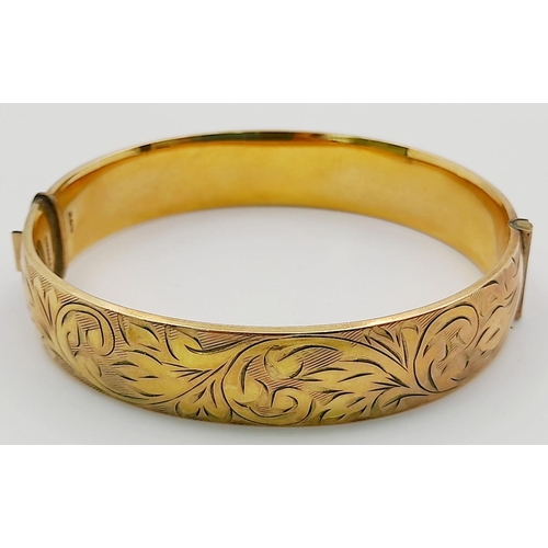 616 - Classic Vintage GOLD BANGLE. Beautifully decorated. Hinge in perfect working order. Inside bangle sh... 