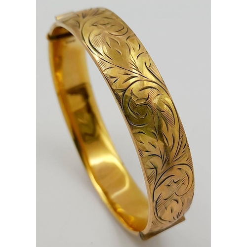 616 - Classic Vintage GOLD BANGLE. Beautifully decorated. Hinge in perfect working order. Inside bangle sh... 