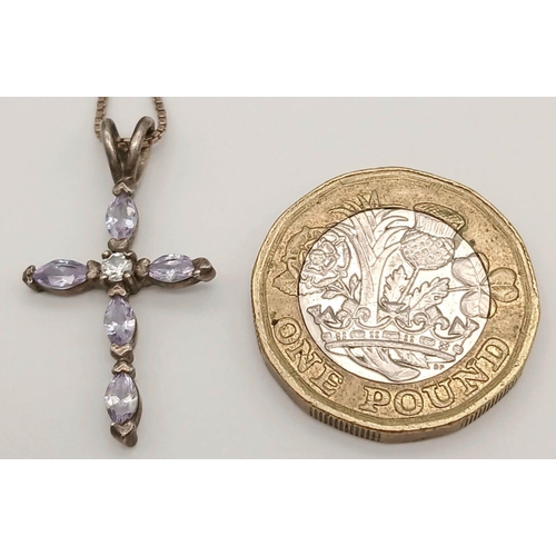 800 - A fancy 925 silver CZ cluster cross pendant on silver chain. Total weight 3.3G. Total length 40cm.