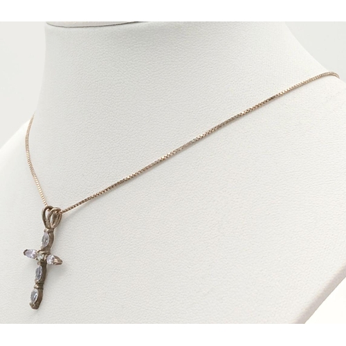 800 - A fancy 925 silver CZ cluster cross pendant on silver chain. Total weight 3.3G. Total length 40cm.