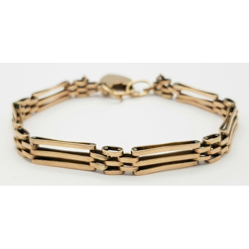 9 - A 9K GOLD VINTAGE GATE BRACELET .    13.6gms