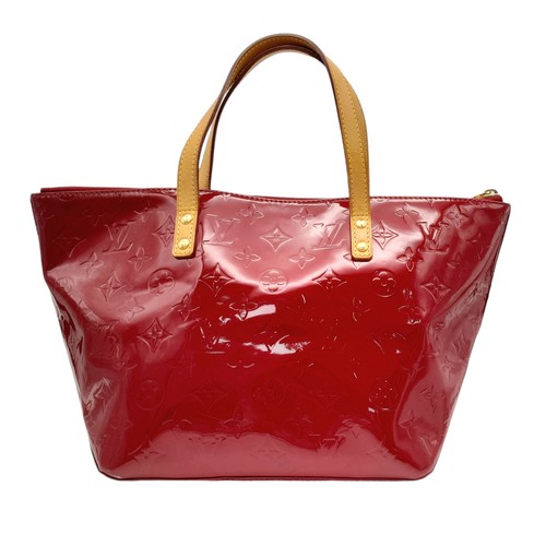 82 - A Louis Vuitton Red Vernis Alma PM Bag. Vernis leather exterior with gold-toned hardware, dual top h... 