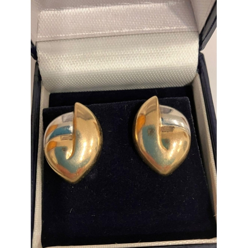 21 - An elegant pair of 9 carat YELLOW and WHITE GOLD EARRINGS. Beautiful abstract design, complete with ... 