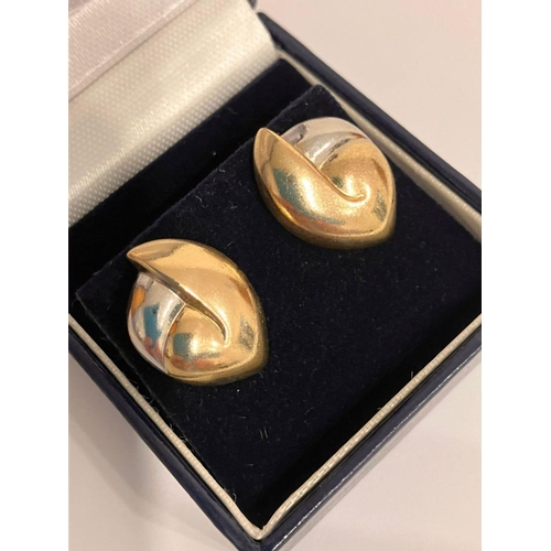 21 - An elegant pair of 9 carat YELLOW and WHITE GOLD EARRINGS. Beautiful abstract design, complete with ... 