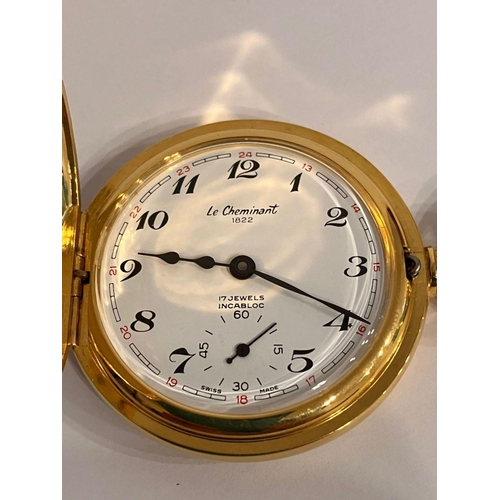 399 - Vintage ‘LE CHEMINANT’  HALF HUNTER POCKET WATCH. Finished in gold tone. Swiss made. Manual winding ... 