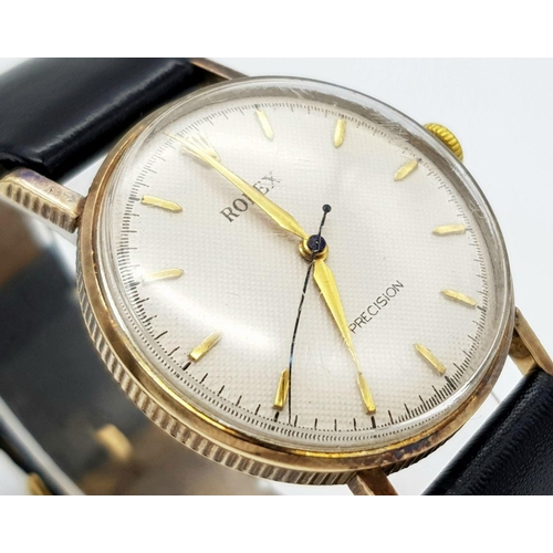 155 - A Vintage 1957 Rolex Precision 9K Gold Cased Gents Watch. Hand wind movement. Black leather strap wi... 