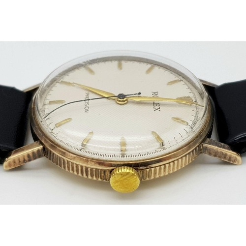 155 - A Vintage 1957 Rolex Precision 9K Gold Cased Gents Watch. Hand wind movement. Black leather strap wi... 