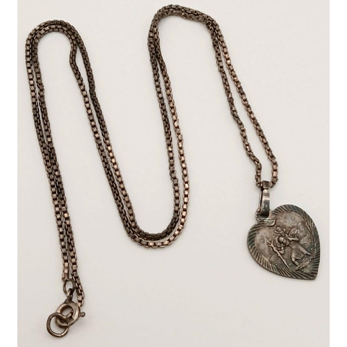 1591 - A vintage sterling silver St Christopher Heart pendant on silver box chain. Total weight 5.2G. Total... 