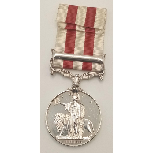 233 - An Indian Mutiny Medal 1857-1858, with clasp ‘DELHI’; named to John Brown 1st Bn 8th Regt (later the... 