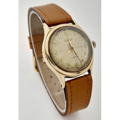 261 - A Vintage Rotary 9K Gold Cased Gents Watch. New brown leather strap. 9K gold case - 30mm. Patinaed d... 